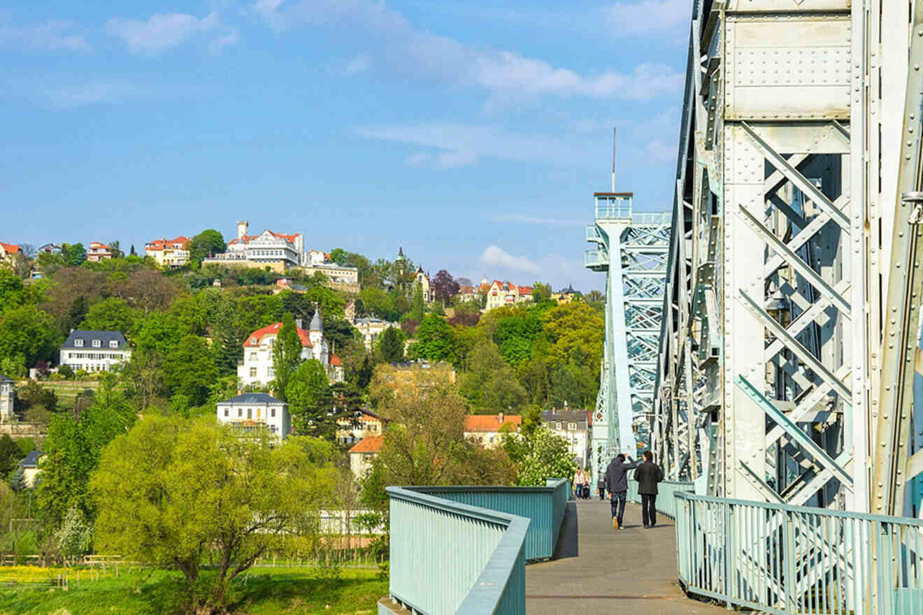 people walking on the Blue Bridge in Dresden