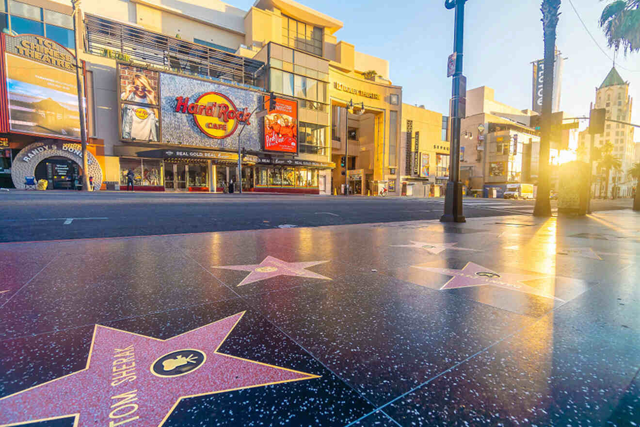 a star on the hollywood walk of fame and hard rock cafe in the background