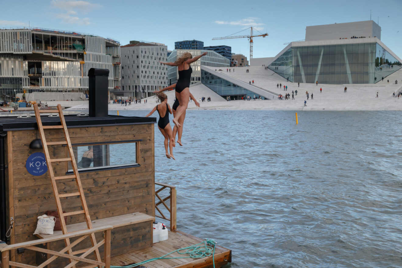 People jumping into the water from boat