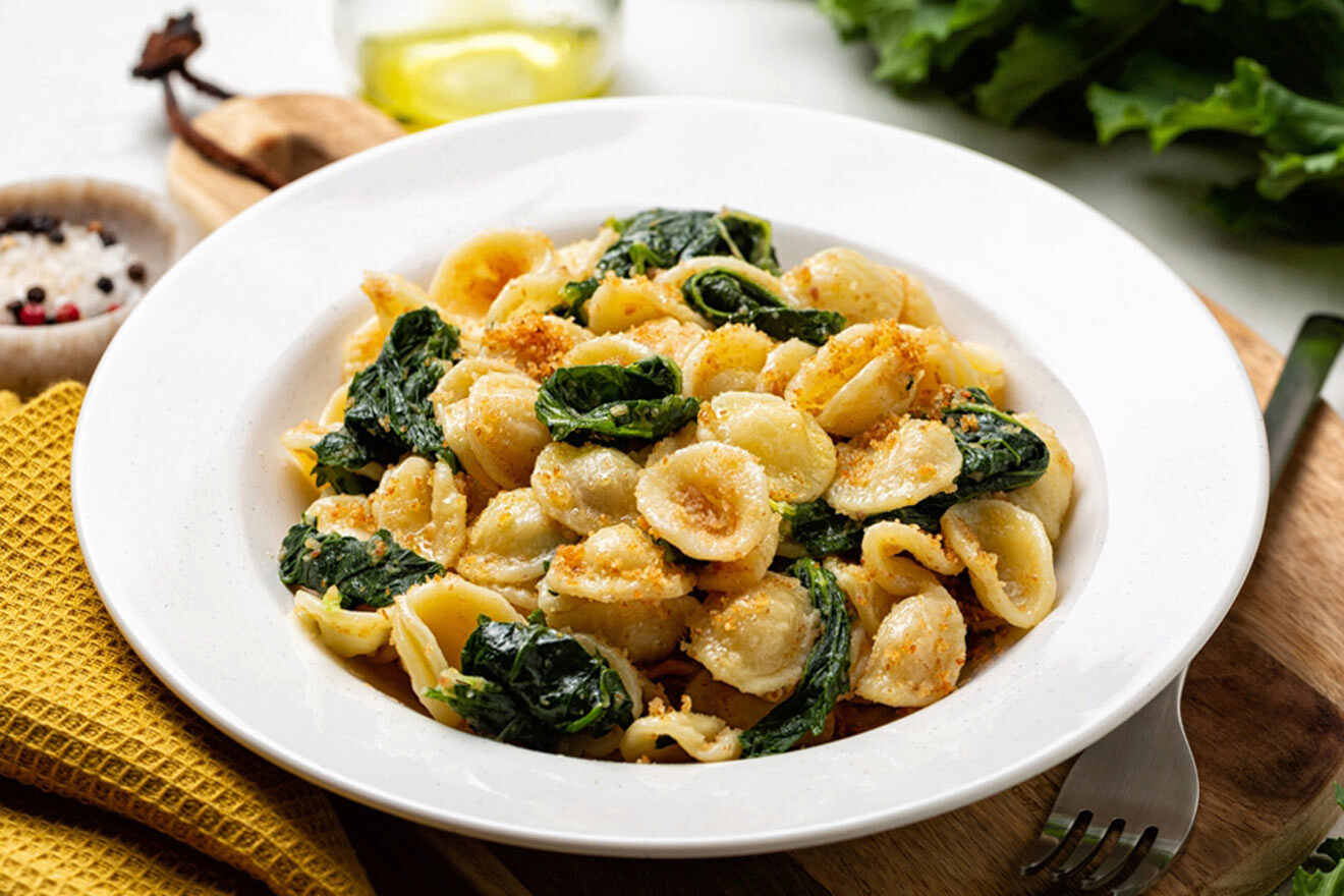 a white bowl filled with orecchiette