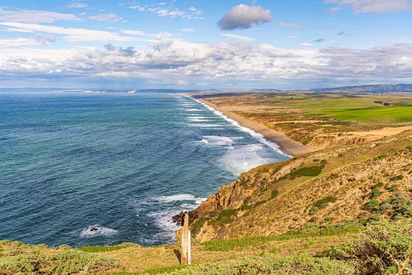 a scenic view of the ocean from a cliff