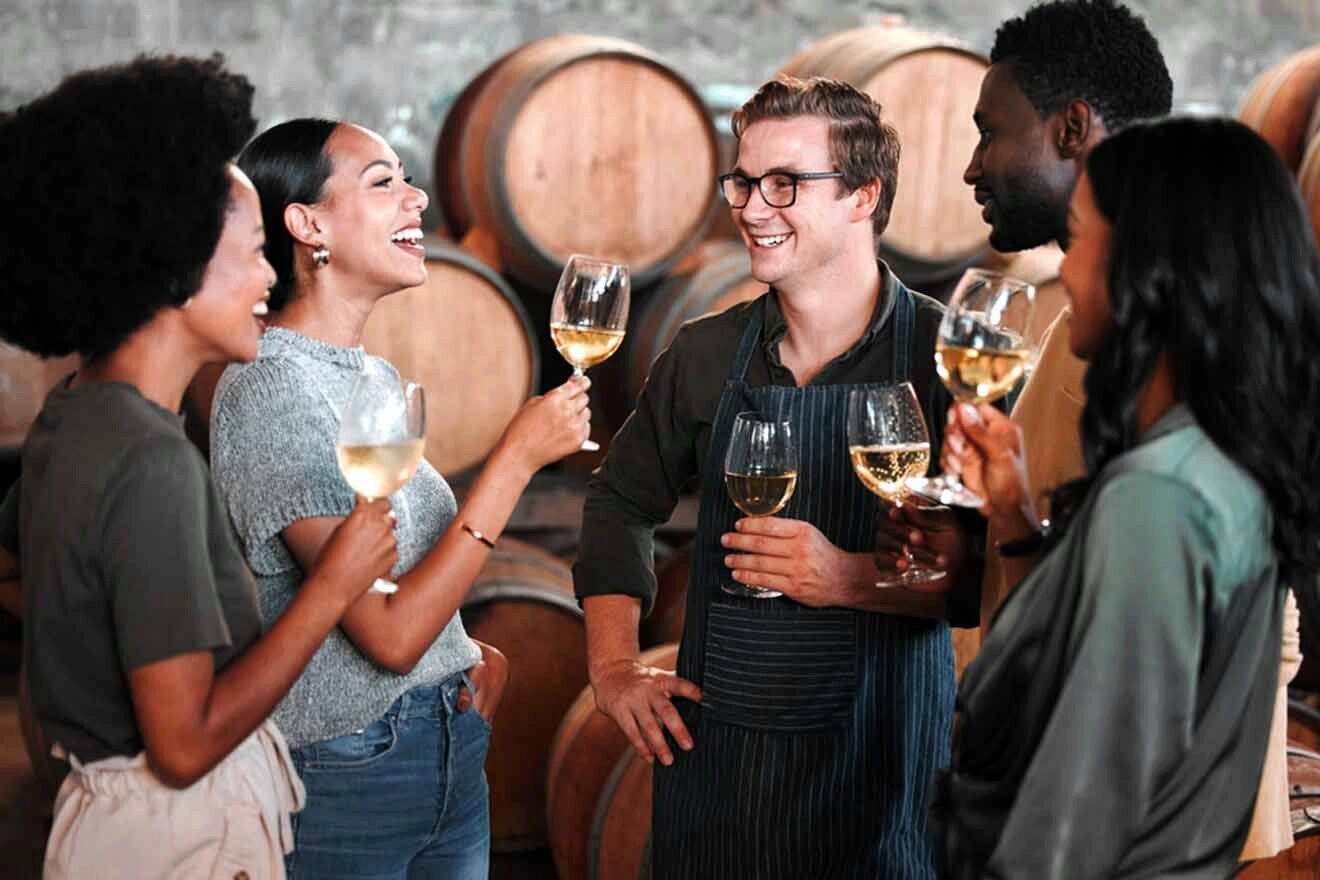 people wine tasting in a wine cellar