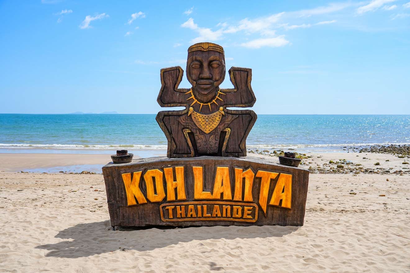 a sign on the beach that says kohl lanta thailand