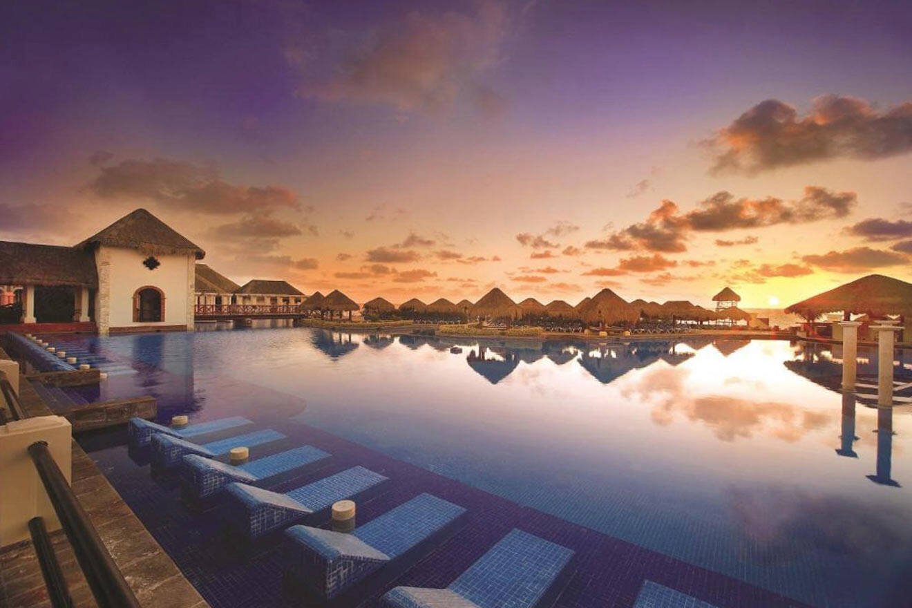 sunset view at a resort with swimming pool