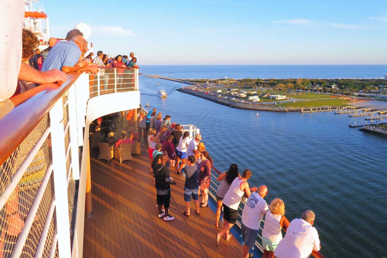 a group of people on a cruise ship on the coast