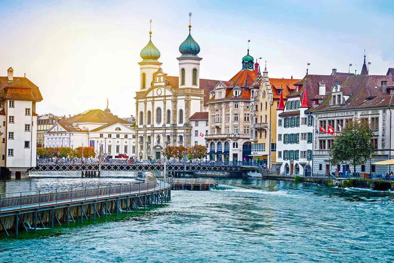 view over the Jesuit Church St Francis Cavier and other buildings with a river in front