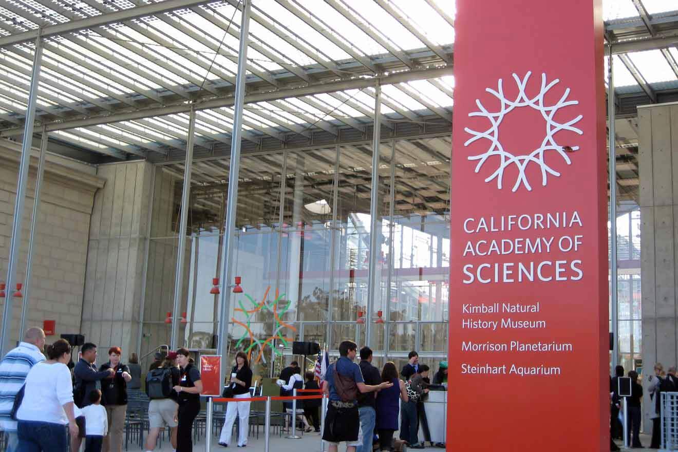 California academy of sciences entrance with various people walking around