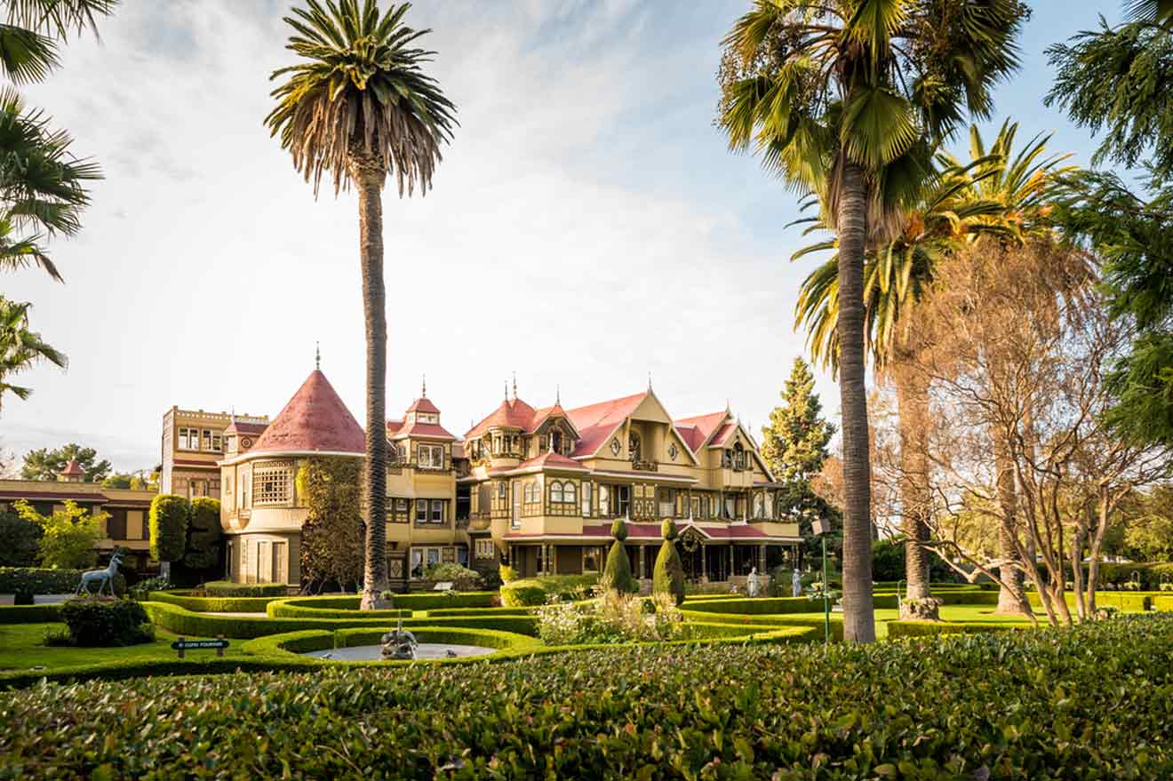 a large house with palm trees