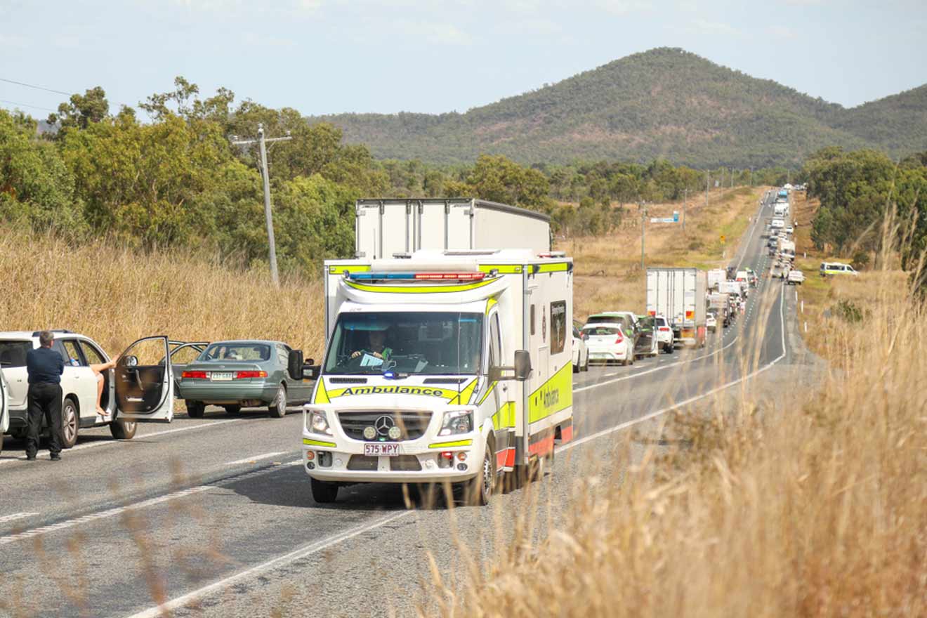 ambulance and cars on a highway