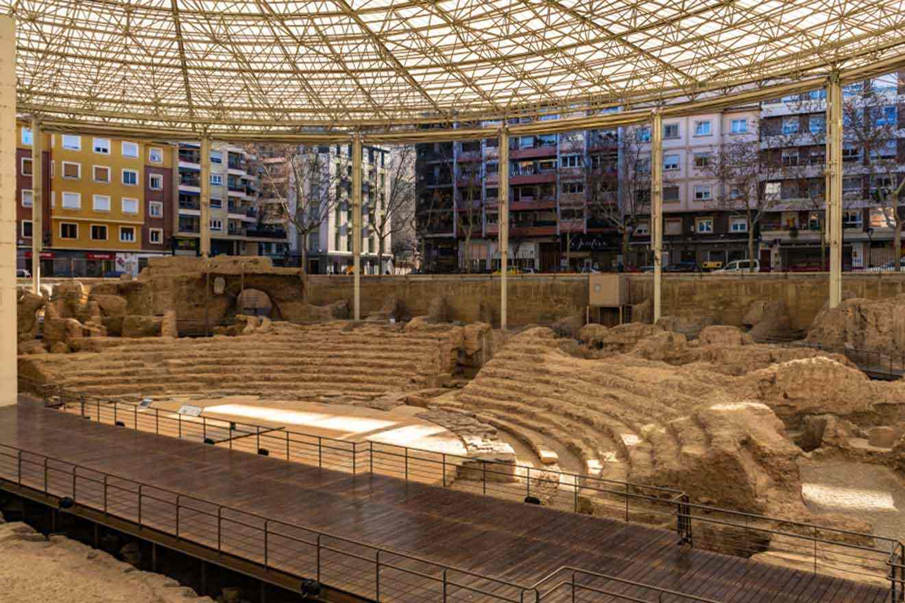 ruins of the roman theatre with a wooden footpath