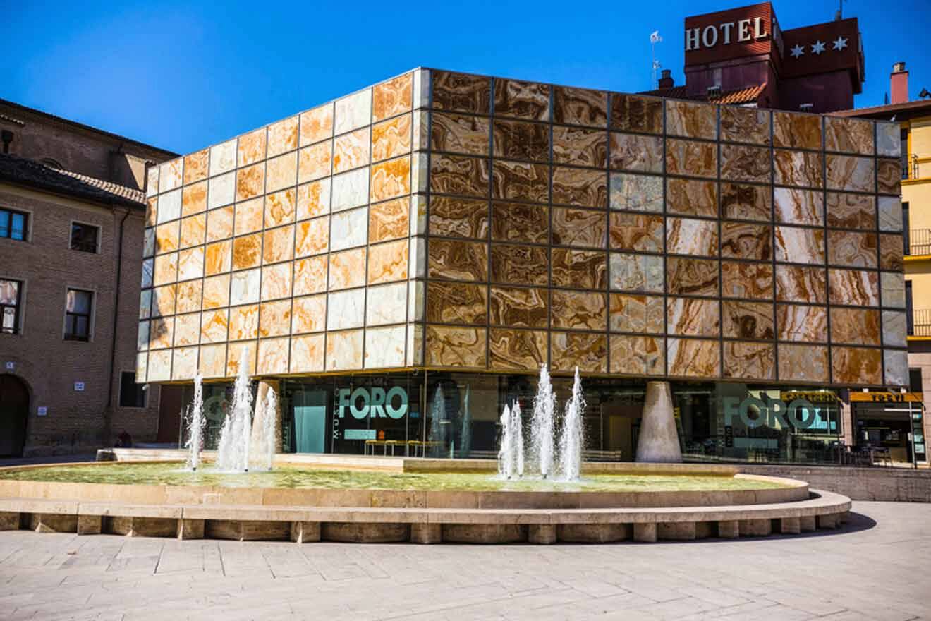 museum's building with a fountain in front of it