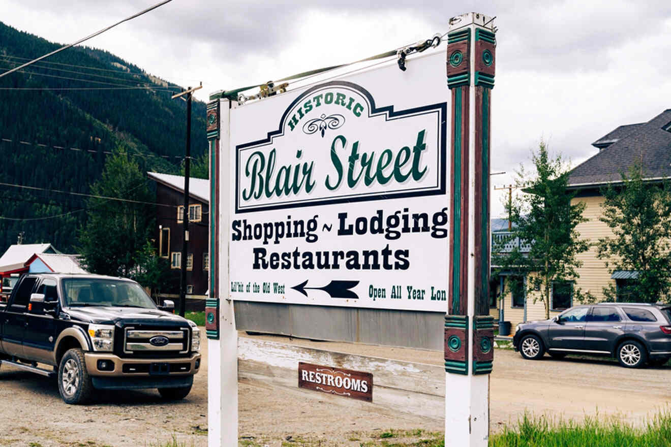 A truck is parked in front of a sign that says blair street.