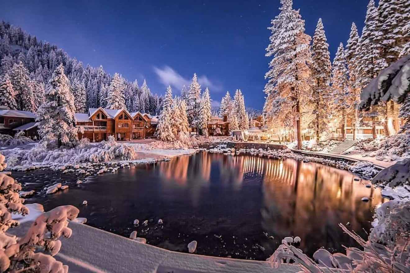 a house next to a lake in winter