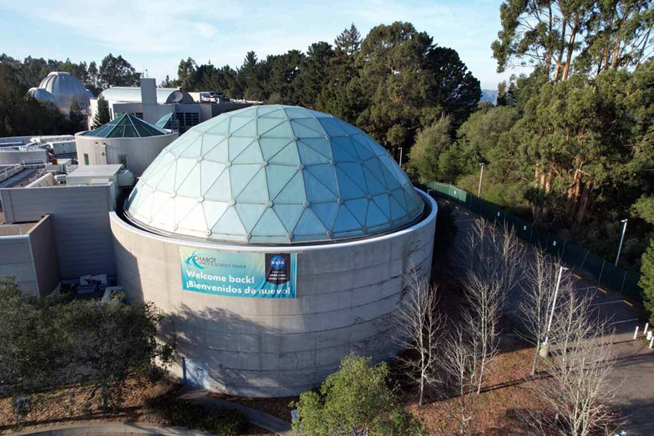 An aerial view of a building with a dome on top.