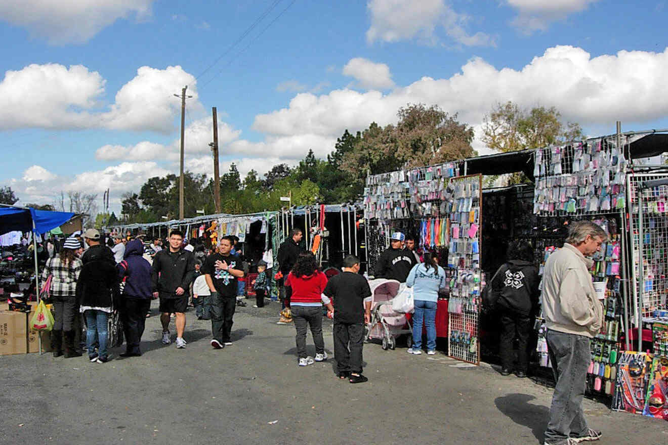 A group of people at a flea market.