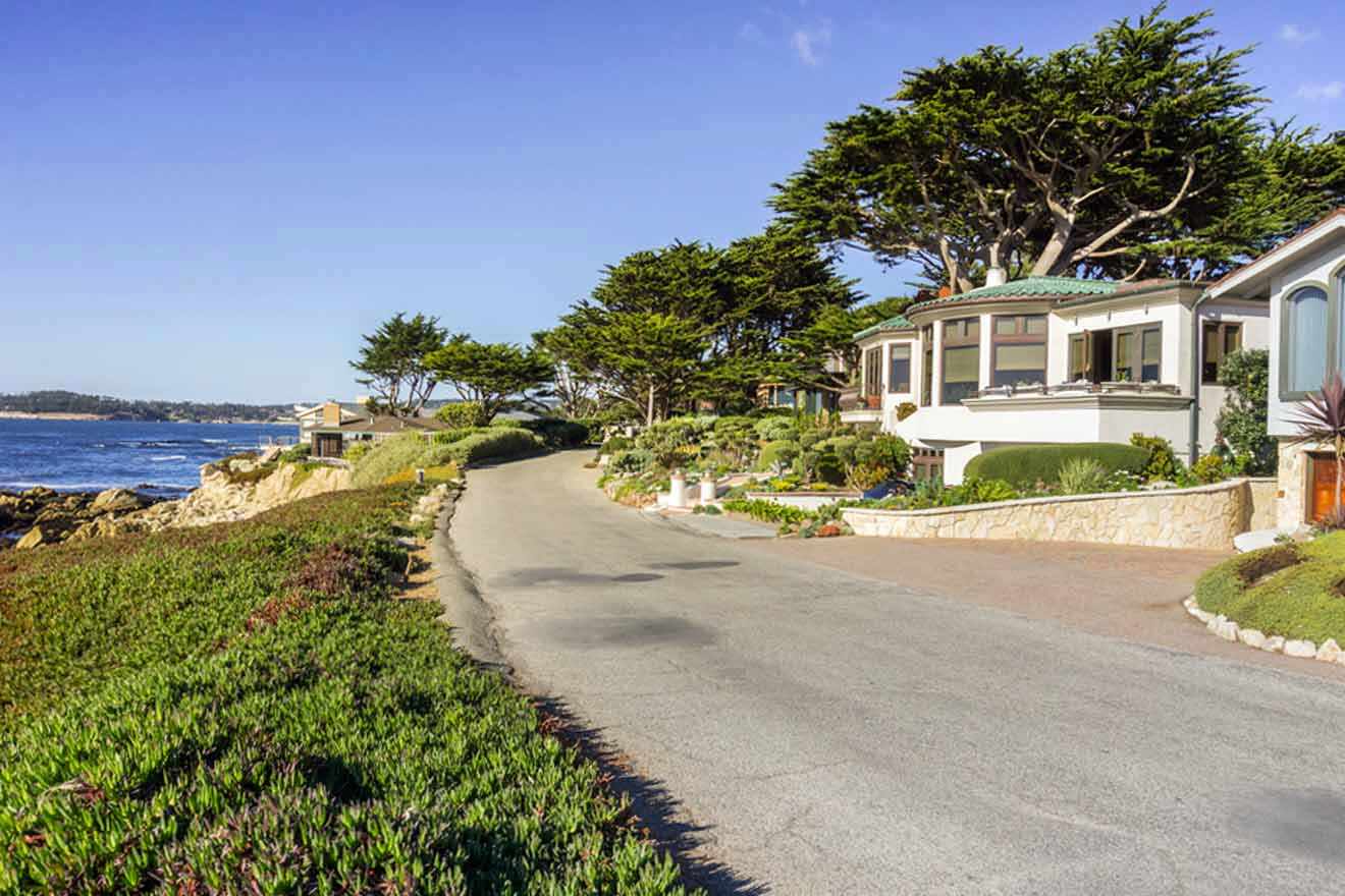 A road leading to a house near the ocean.