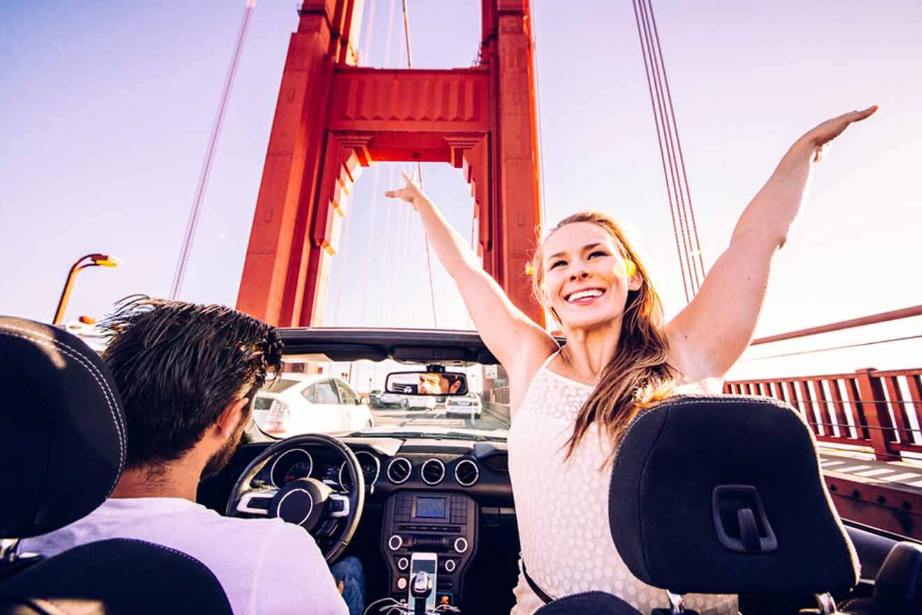 couple riding in a car over the golden gate bridge