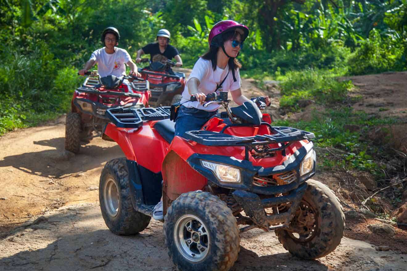 tourists on atvs in a jungle