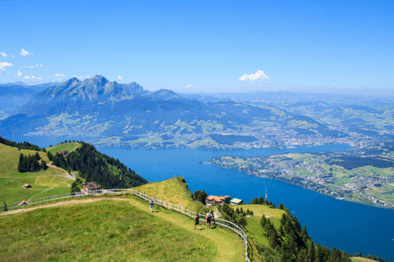 The view from the top of a hill overlooking a lake in switzerland.