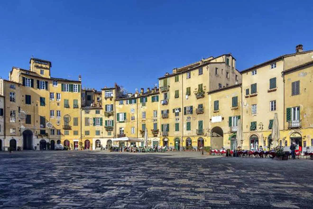 A square in the center of a town in italy.