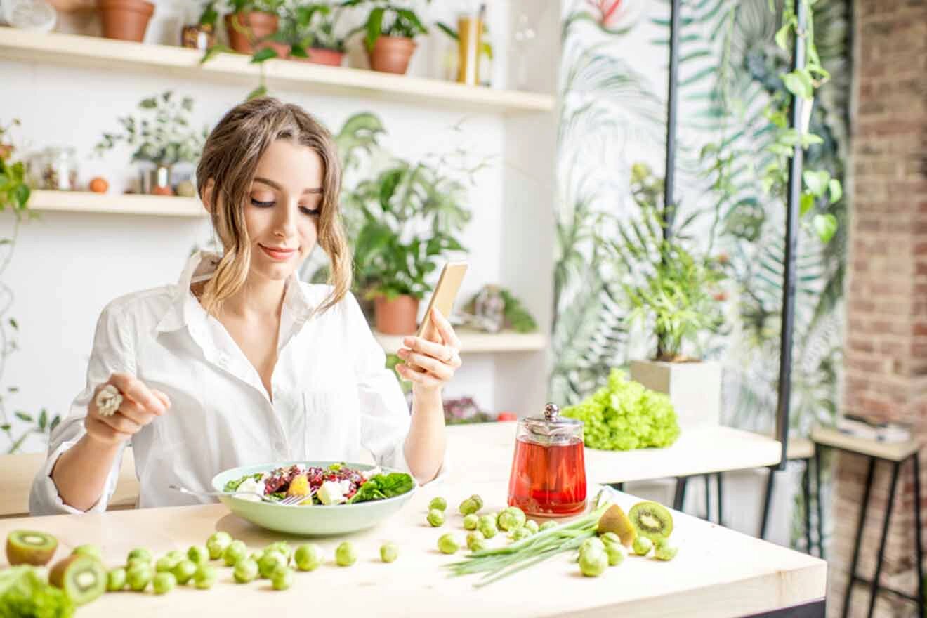 woman eating vegan food at a restaurant