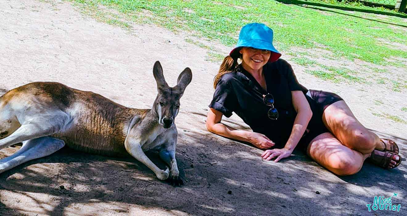 woman lying next to the kangaroo