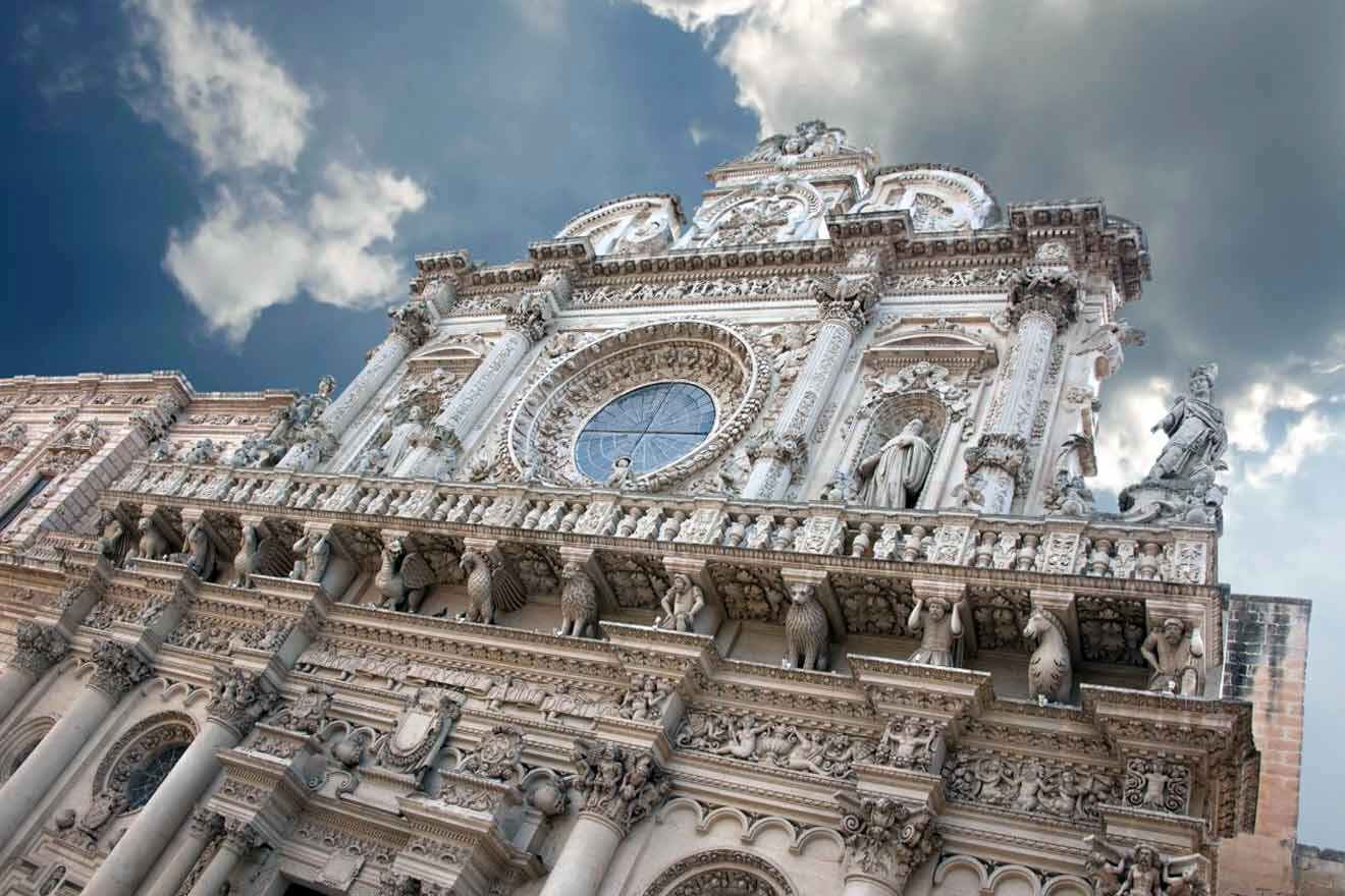 An ornate building with a cloudy sky.