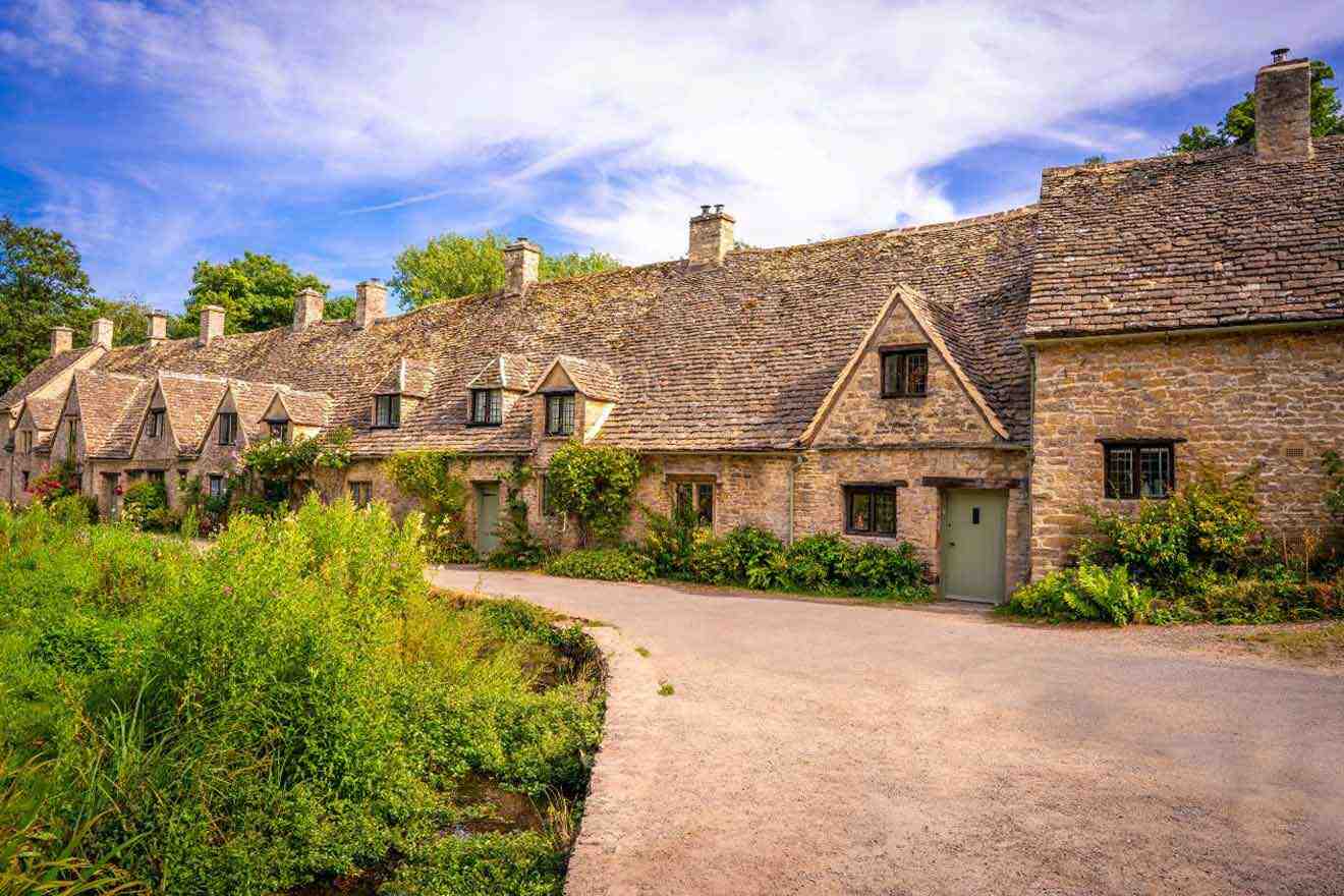 A row of stone cottages in the cotswolds.
