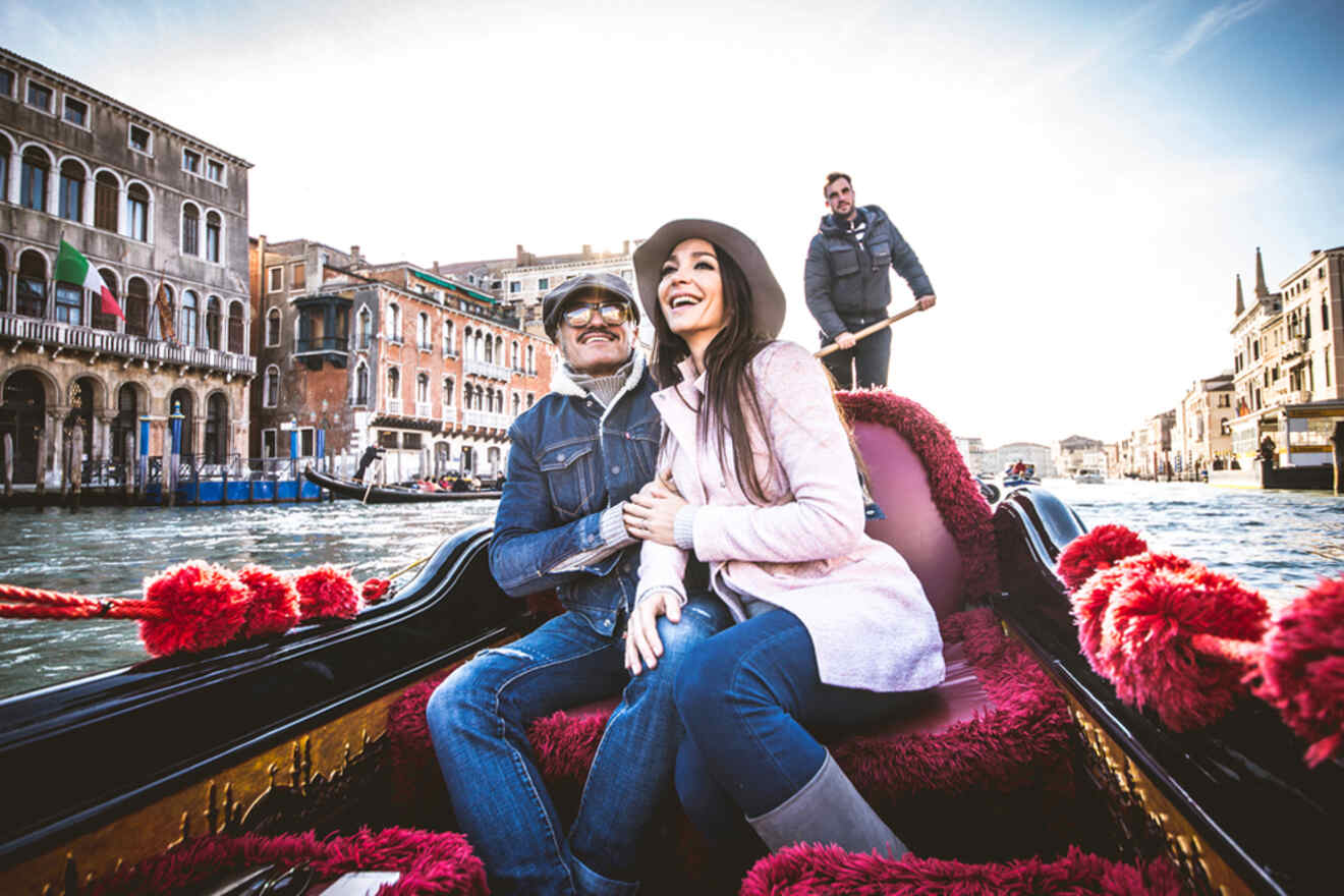 A couple on a gondola in Venice.