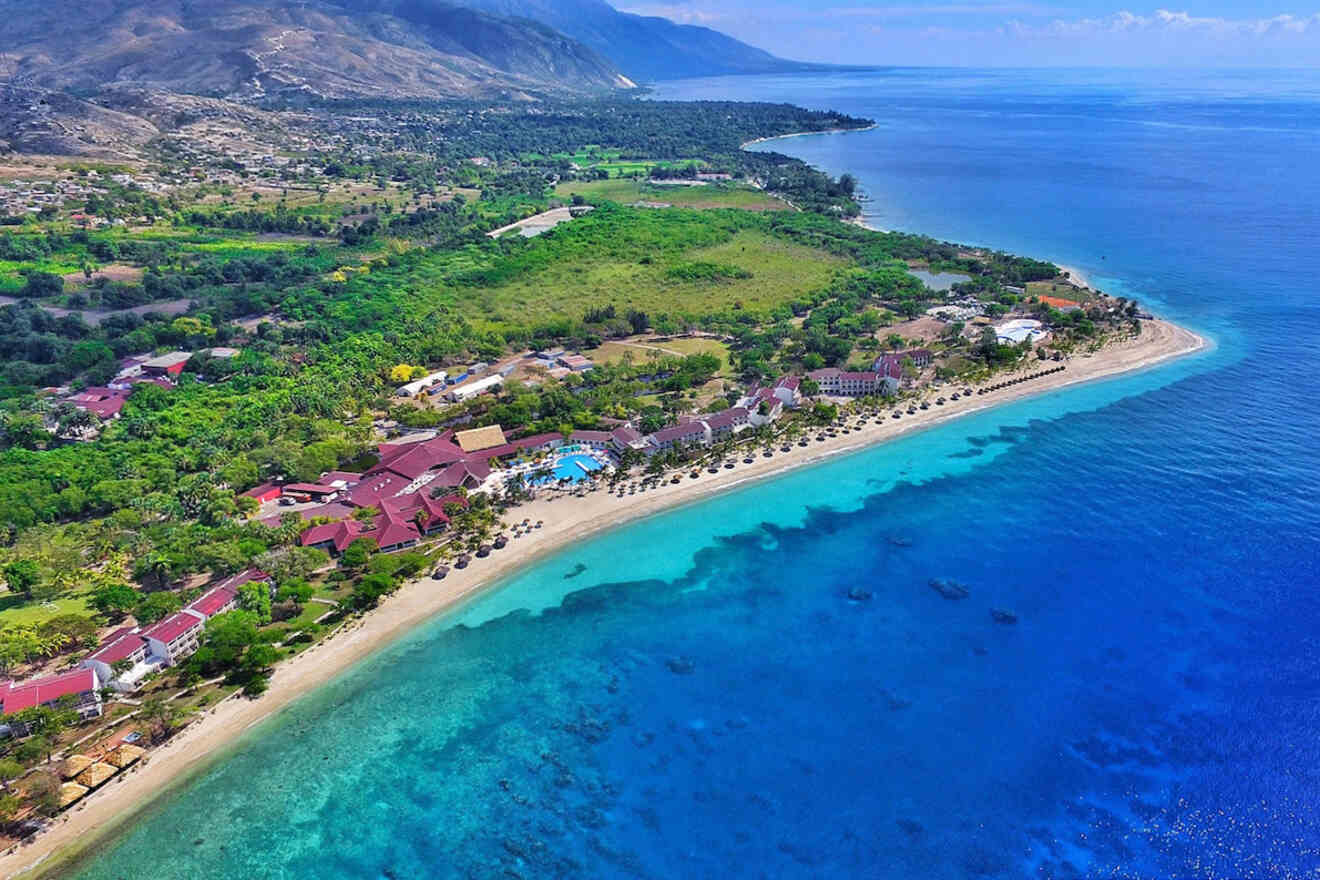 An aerial view of a resort on the beach.