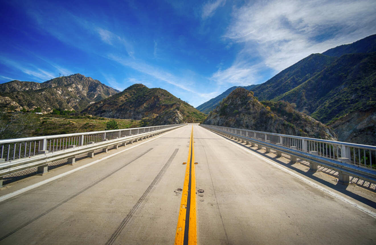 a highway leading towards mountains