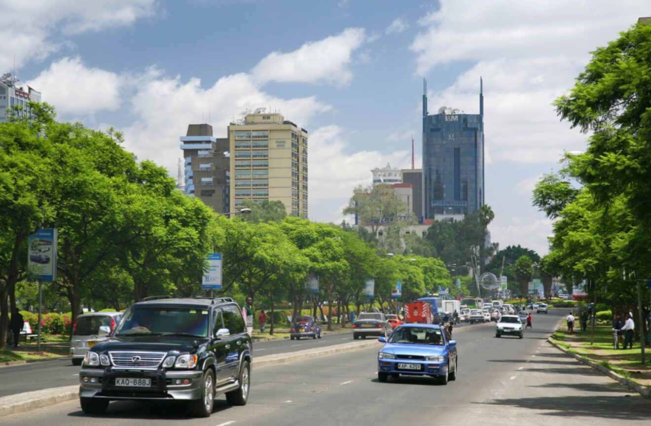 cars driving on a road in the city