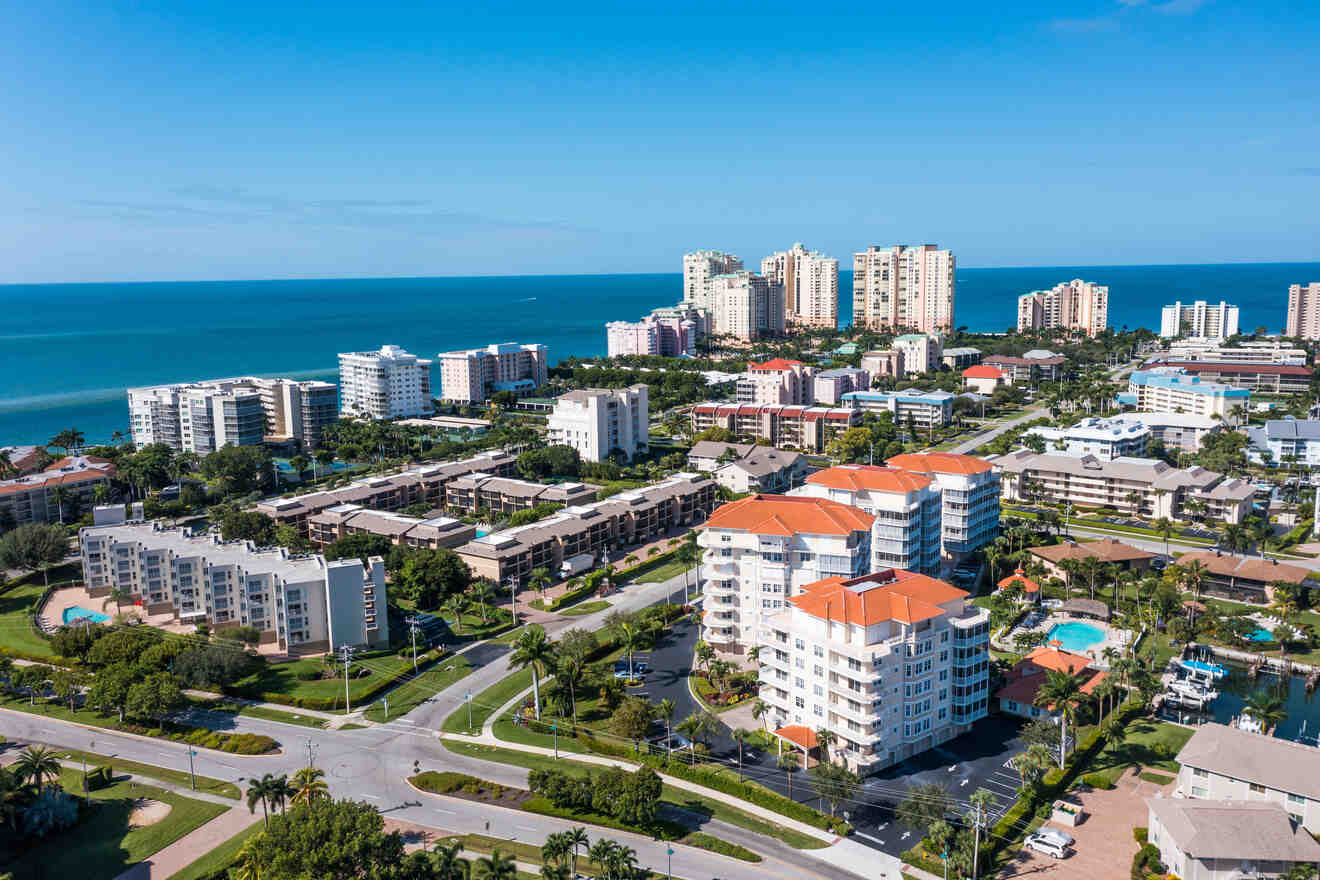 An aerial view of condos and the ocean in marco island.