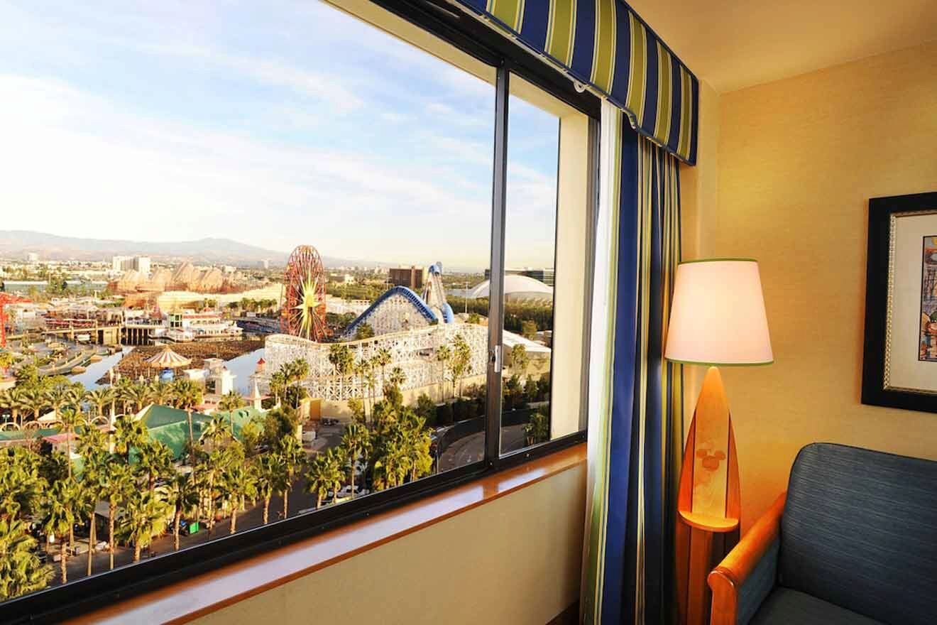 a hotel room with a view of an amusement park.
