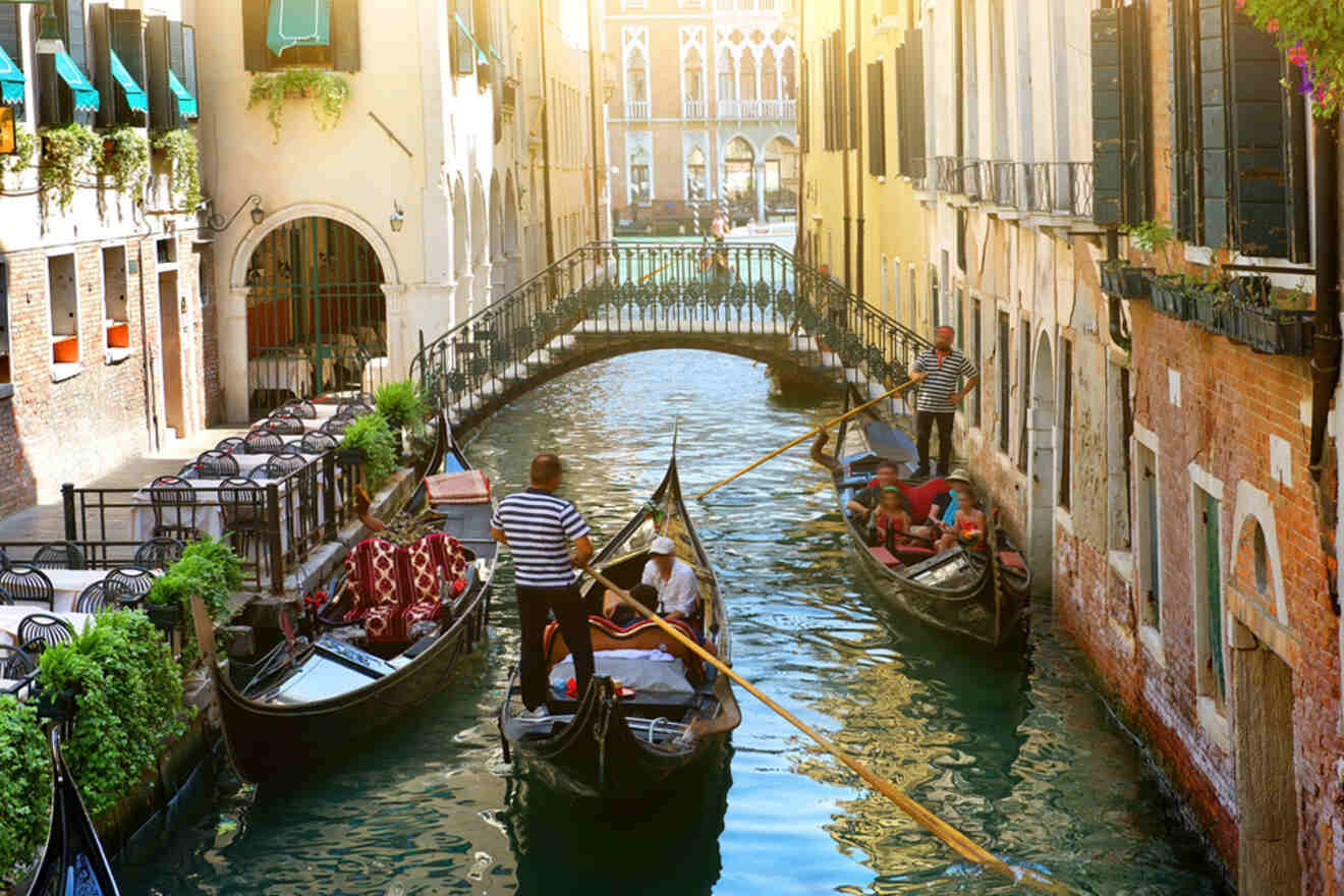 Gondolas on a canal in Venice, Italy.