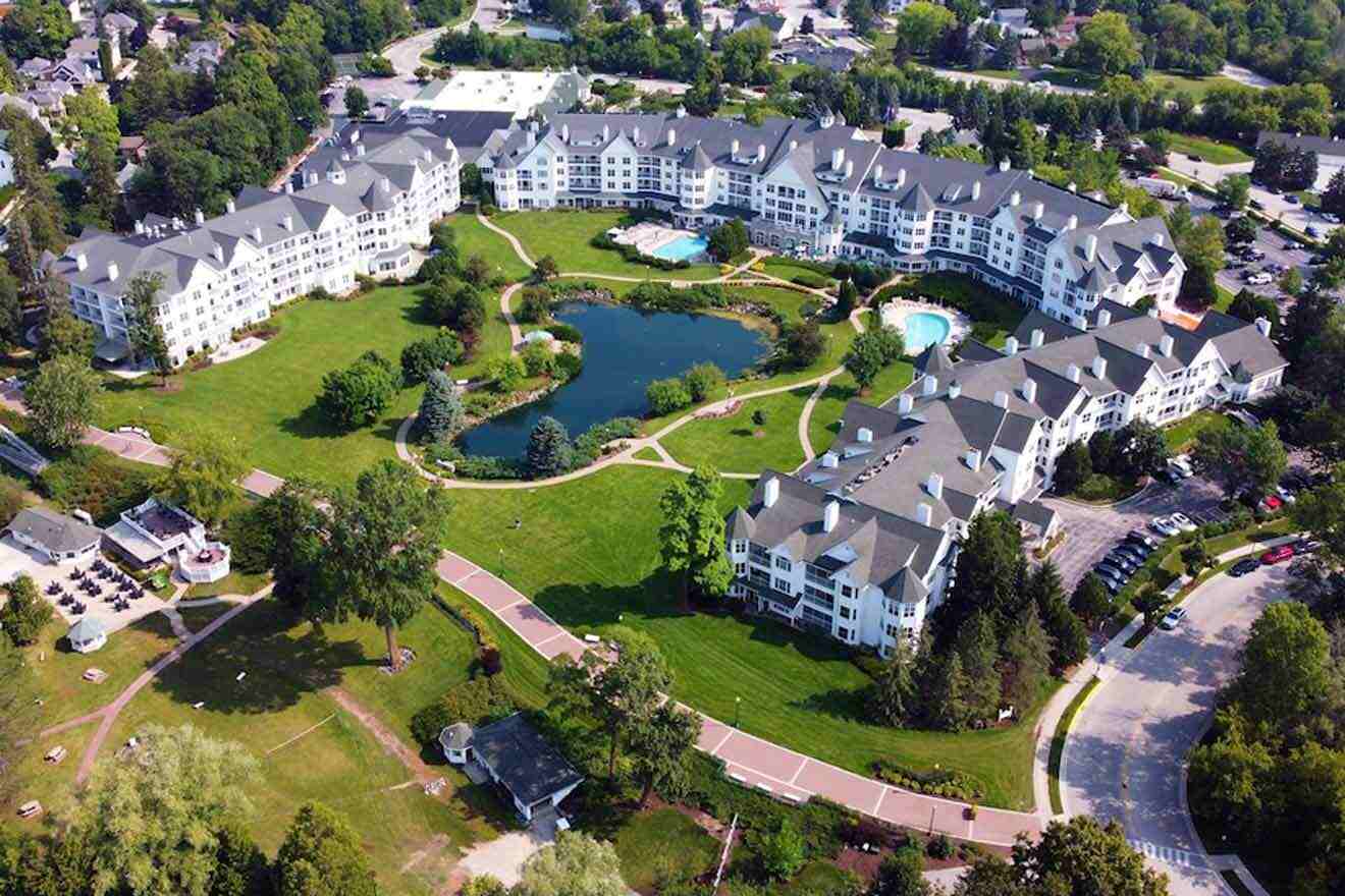 A bird's eye view of a resort in a wooded area.
