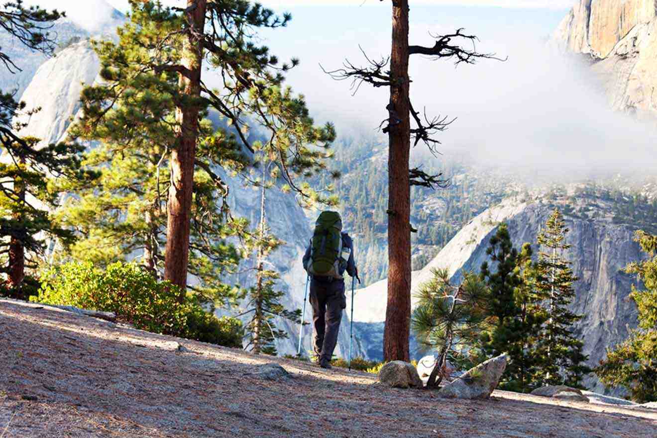 hiker with a backpack walking in Yosemite national park