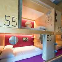 A group of bunk beds in a room.