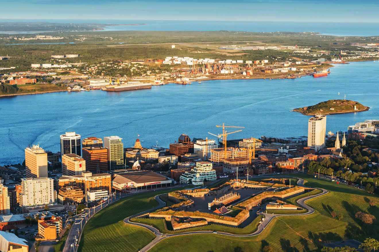 aerial view over the citadel next to a body of water.