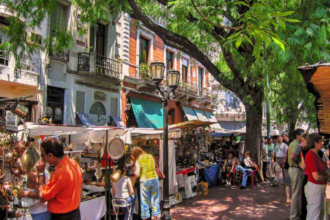 People shopping at an outdoor market in San Telmo, Buenos Aires.