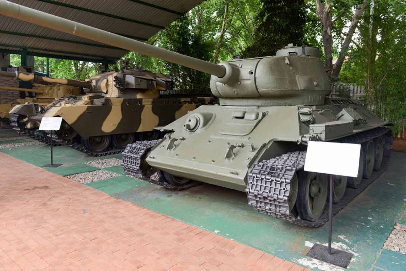 Two tanks are on display in a museum.