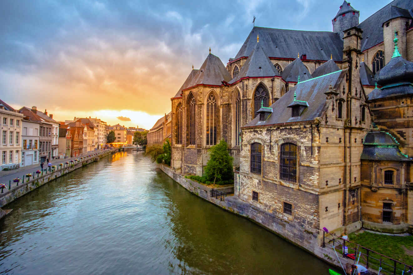 a canal lined with old buildings at sunset