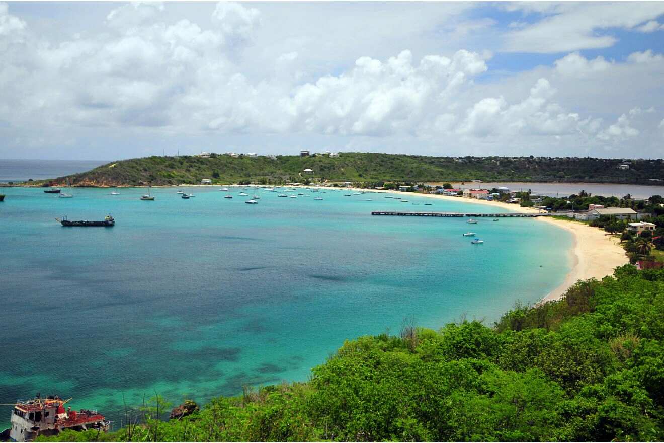 aerial view of a bay with a beach with hotels