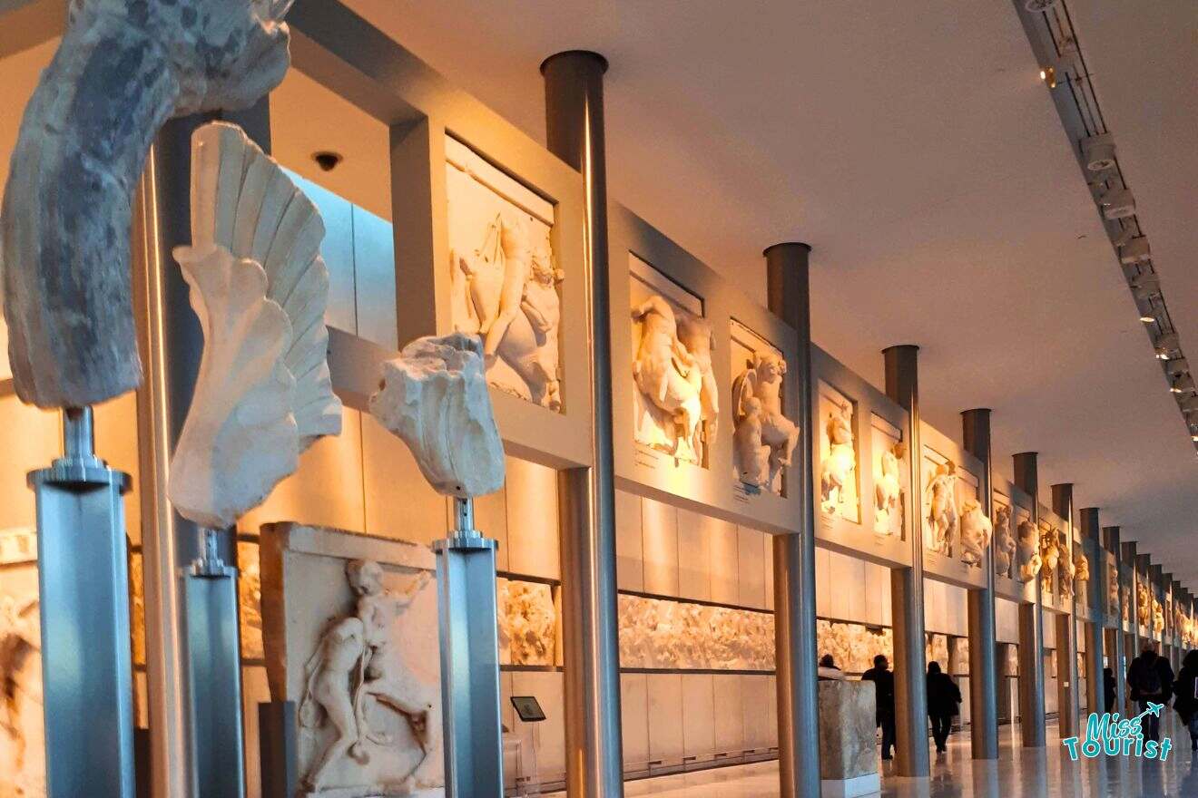 A line of statues in a museum.