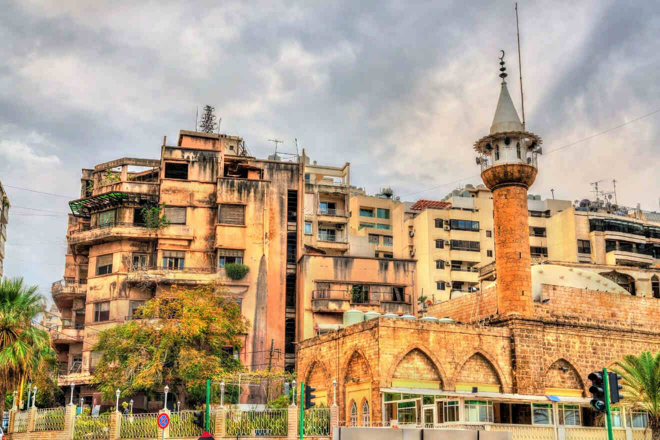 A mosque in the middle of a city.
