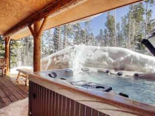 hot tub with mountains in the background