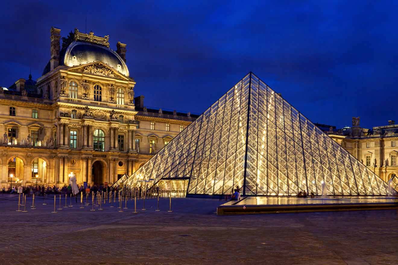 The pyramid of the louvre at night.
