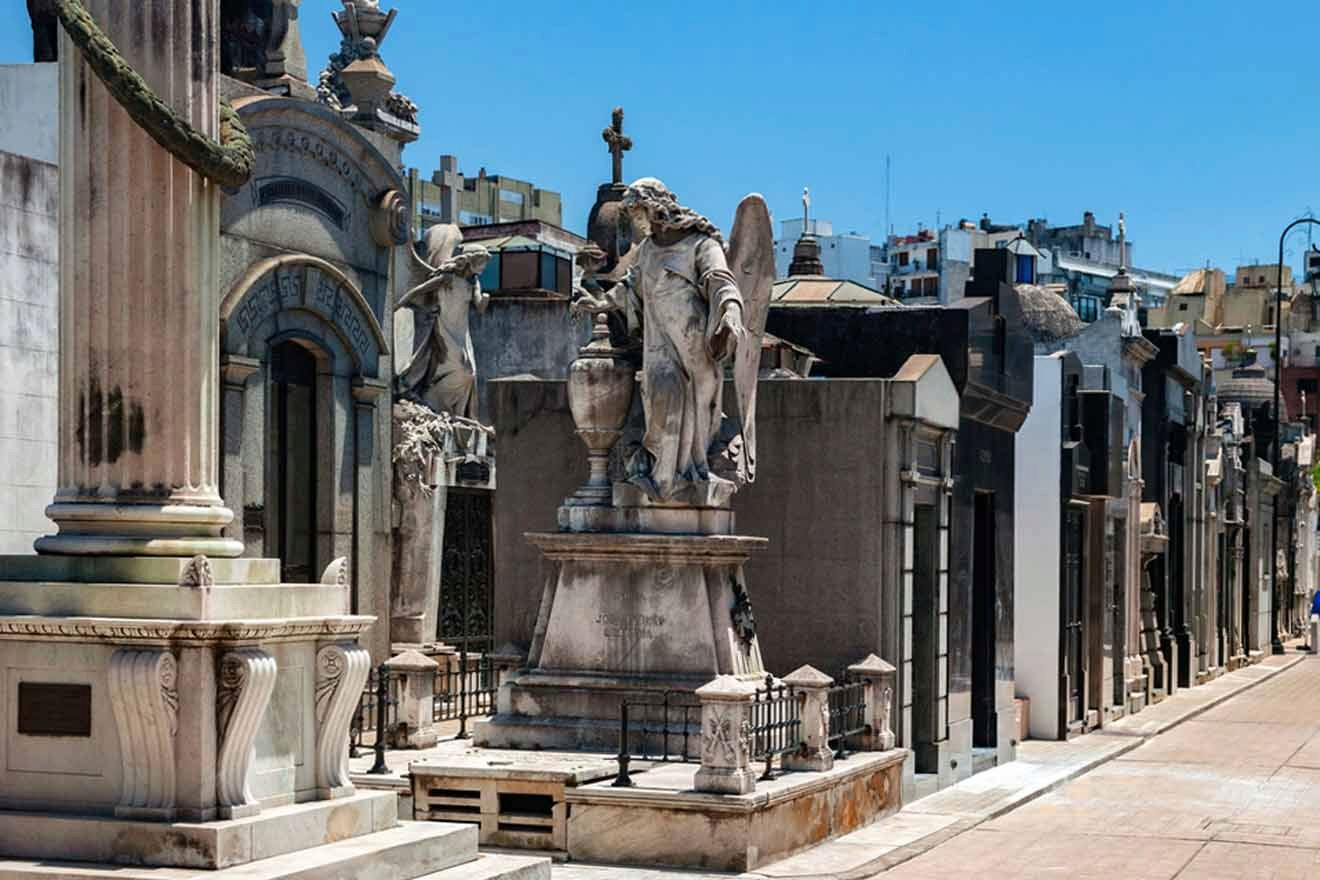 A row of gravestones and statues in the Recoleta cemetery in Buenos Aires