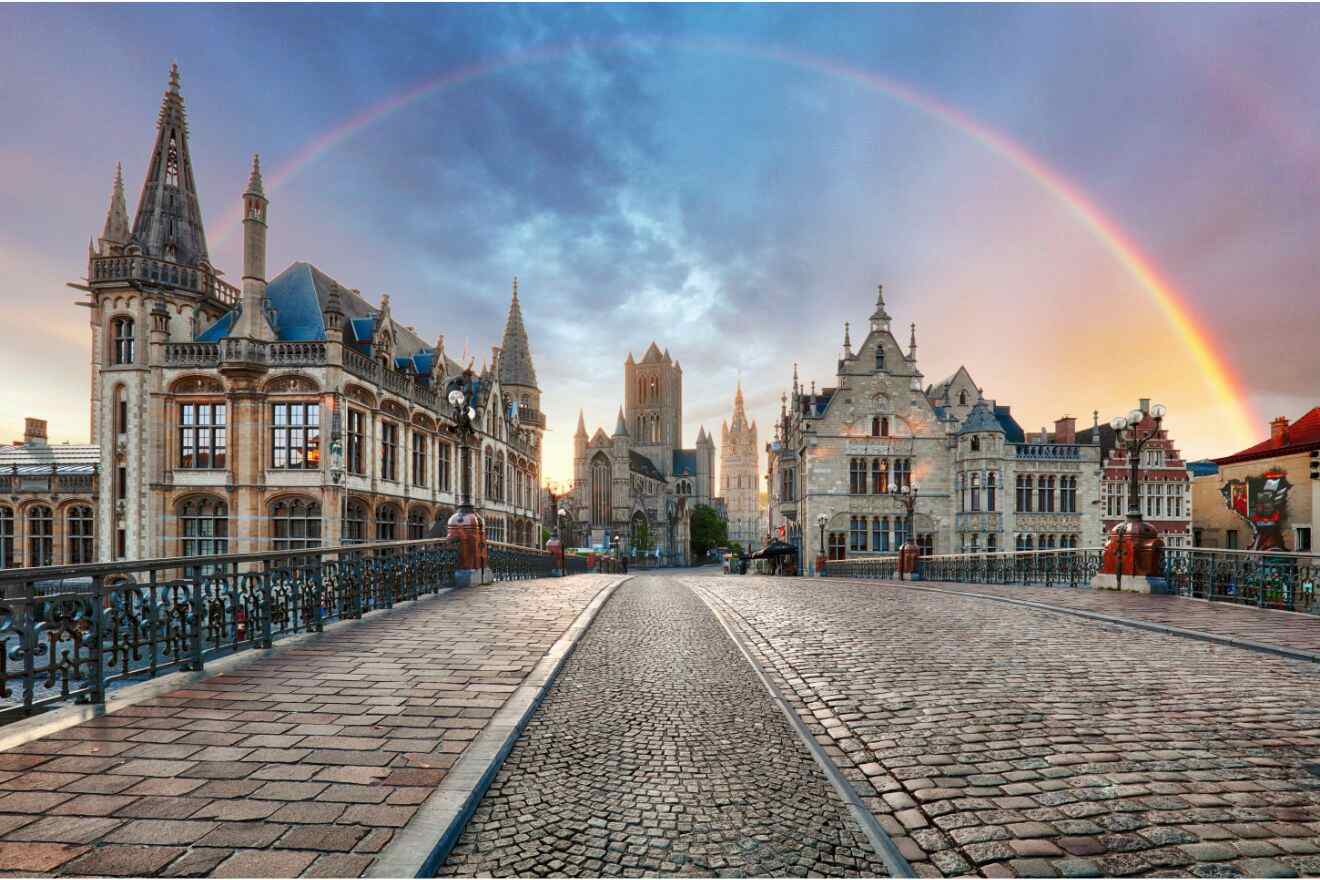 view of a rainbow over an old town