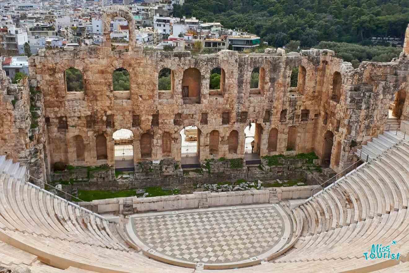 A view of an ancient theatre in the city of athens.